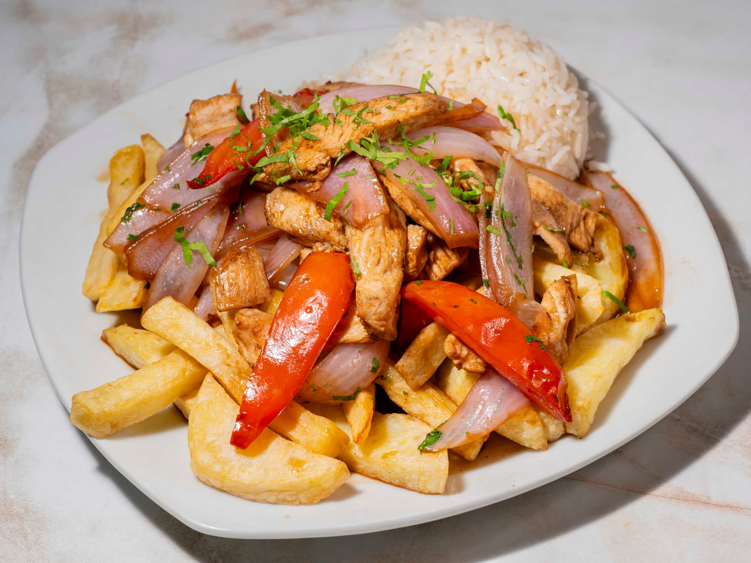 Saltado de Pollo