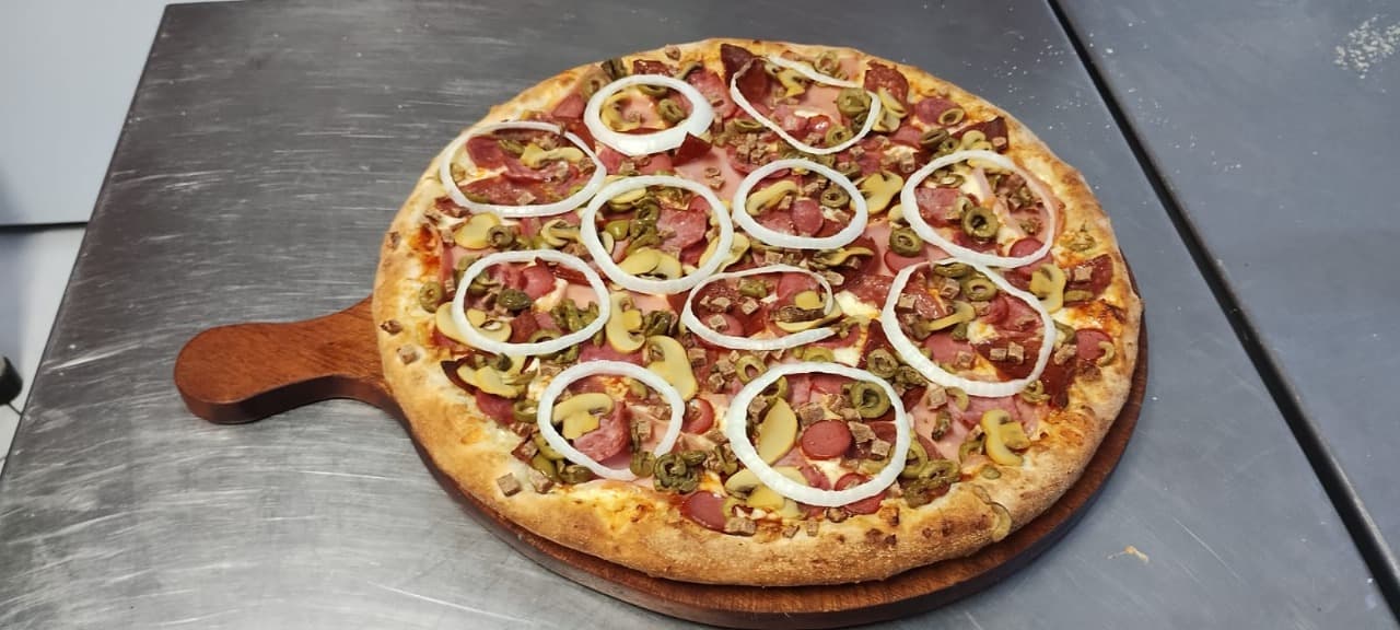 Pizza Suprema Mediana 4 Porciones
