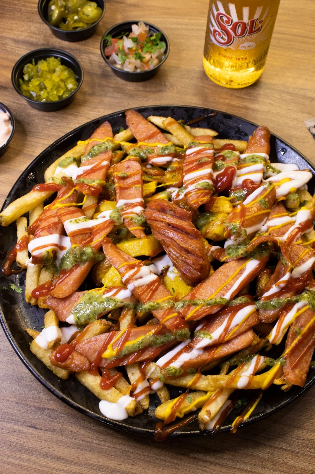 Combo Papas con salchica americana + 2 bebidas