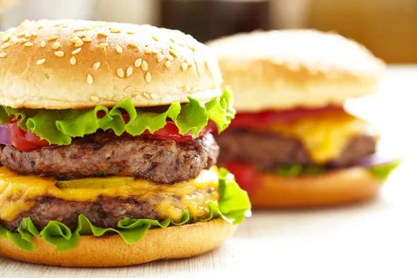 2 Hamburguesas Sencillas - Carne+ Gaseosa Personal