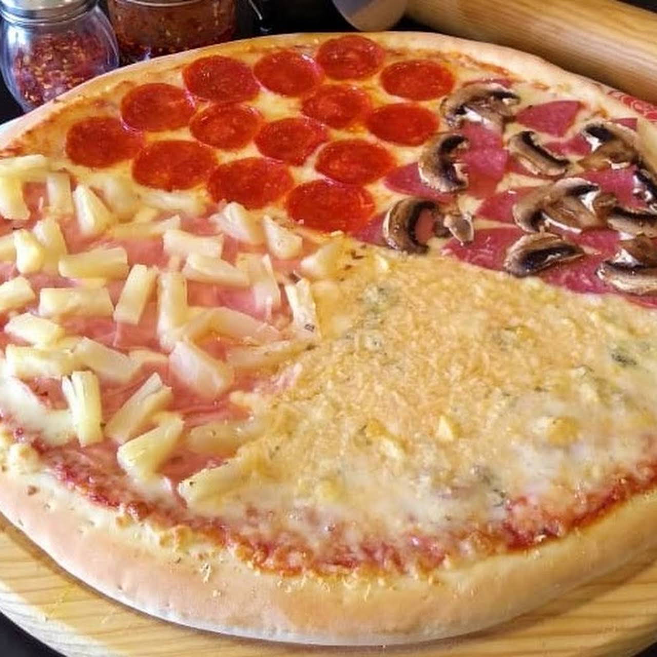 Pizza 4 Cilindros y refresco de 1.5 l.