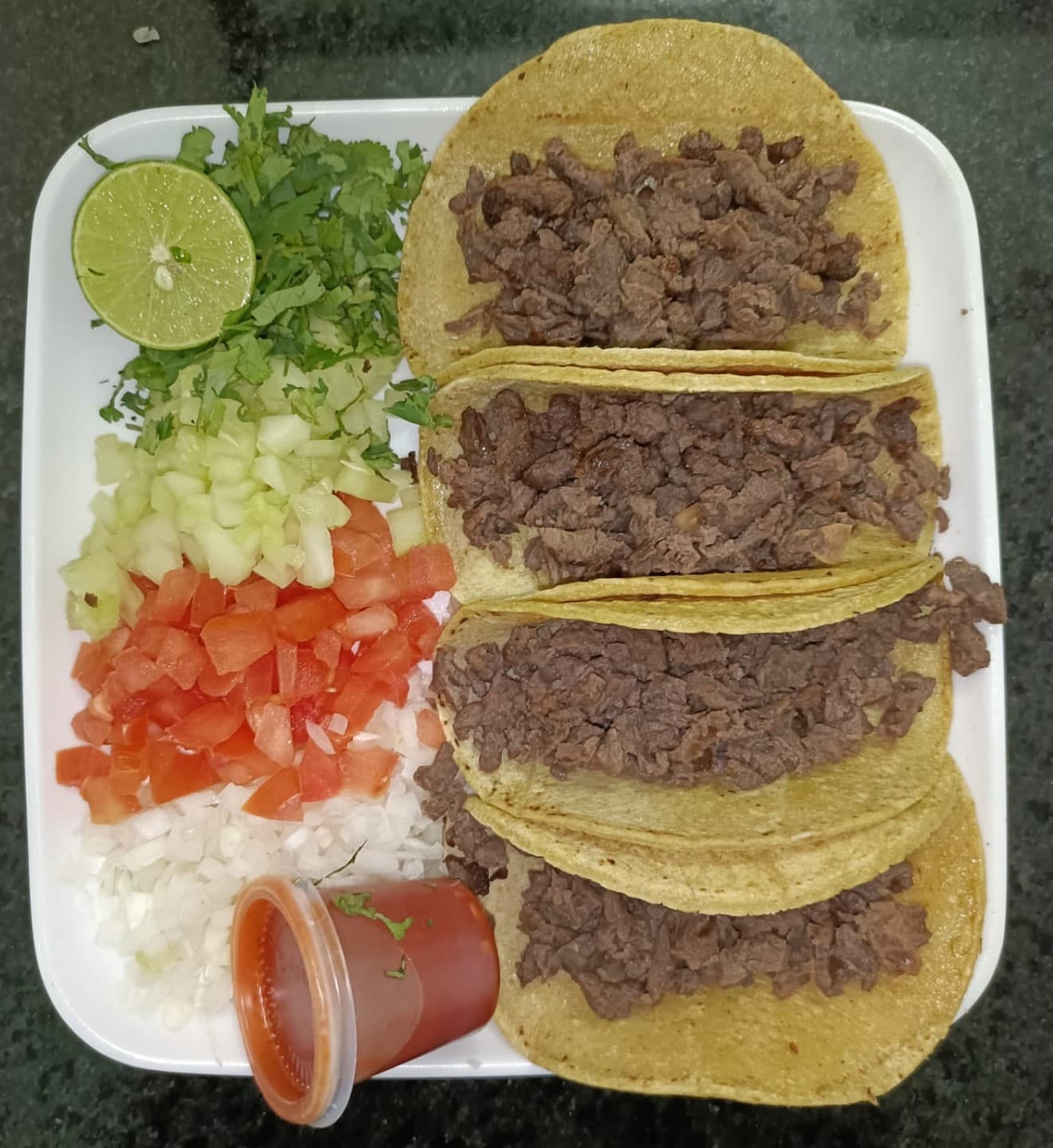 Tacos de Nixtamal con Bistec 4 Porciones.