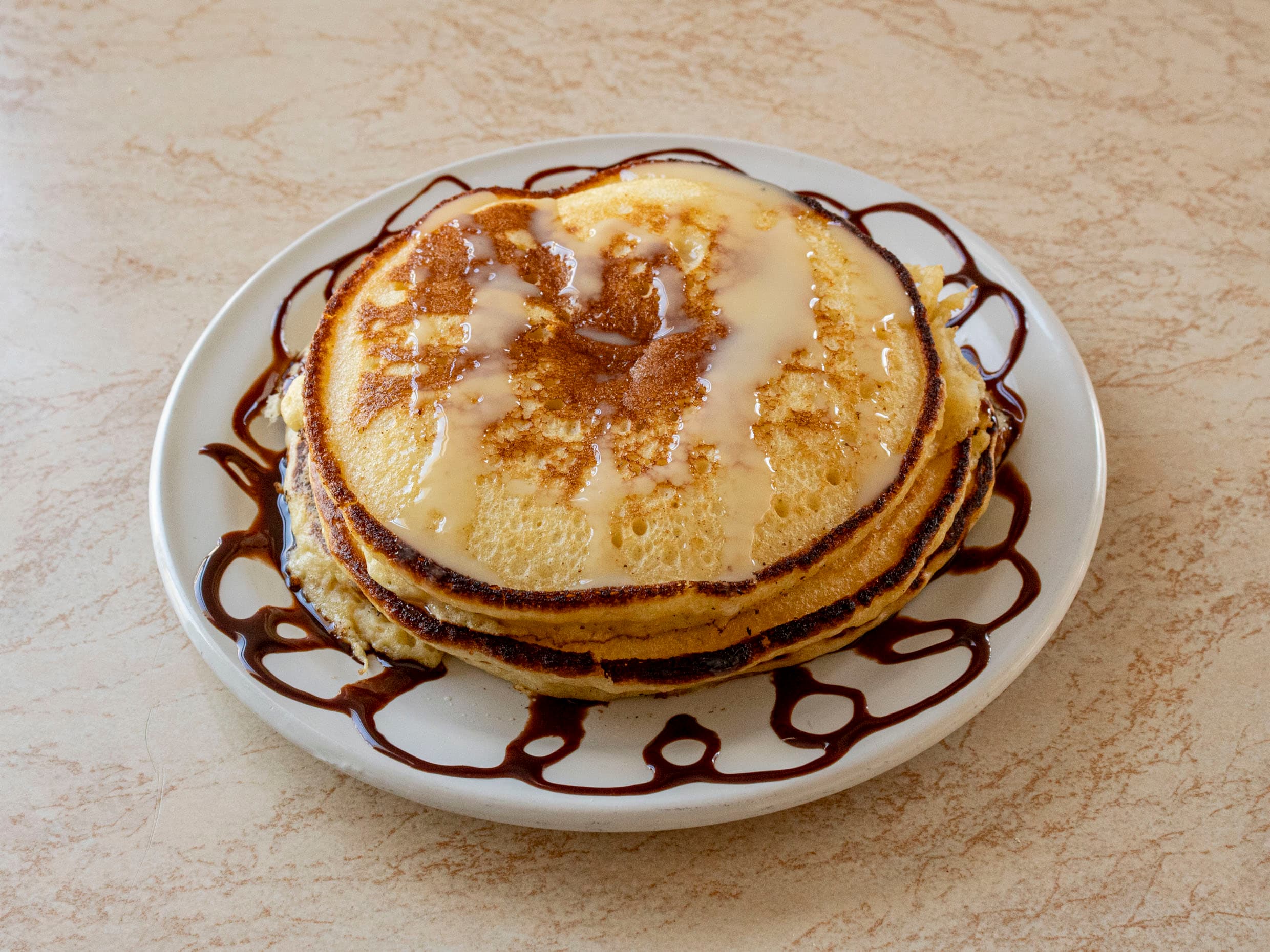 3 Hot Cakes (aparte lechera y mermelada)