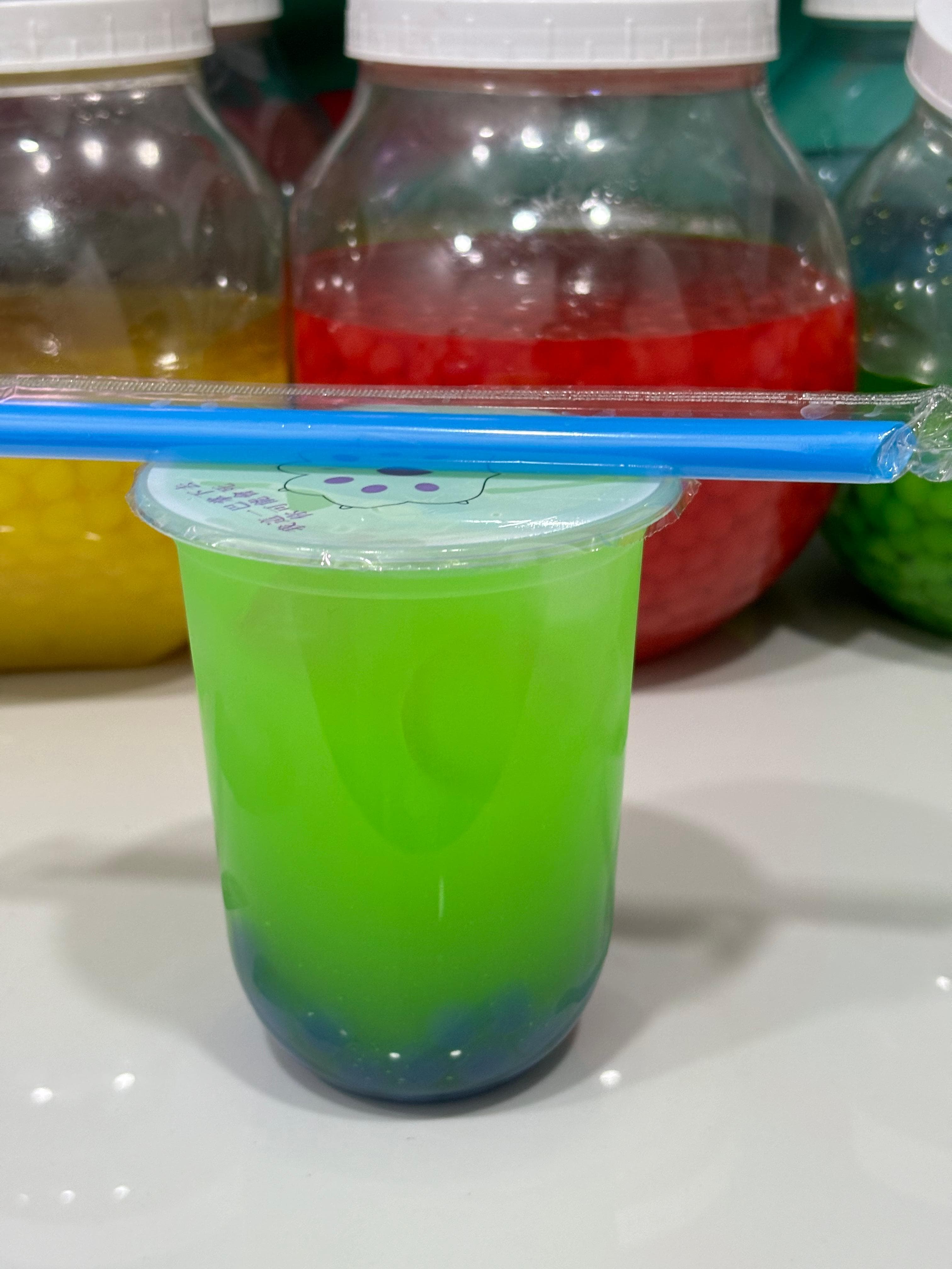 Manzana Verde Neón con Perlas Explosiva Blue Berry