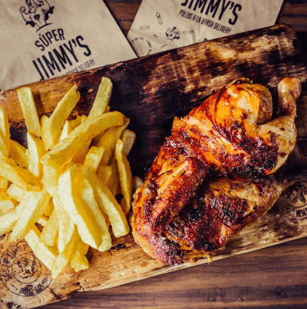 1/2 Pollo con Papas y Tequeños