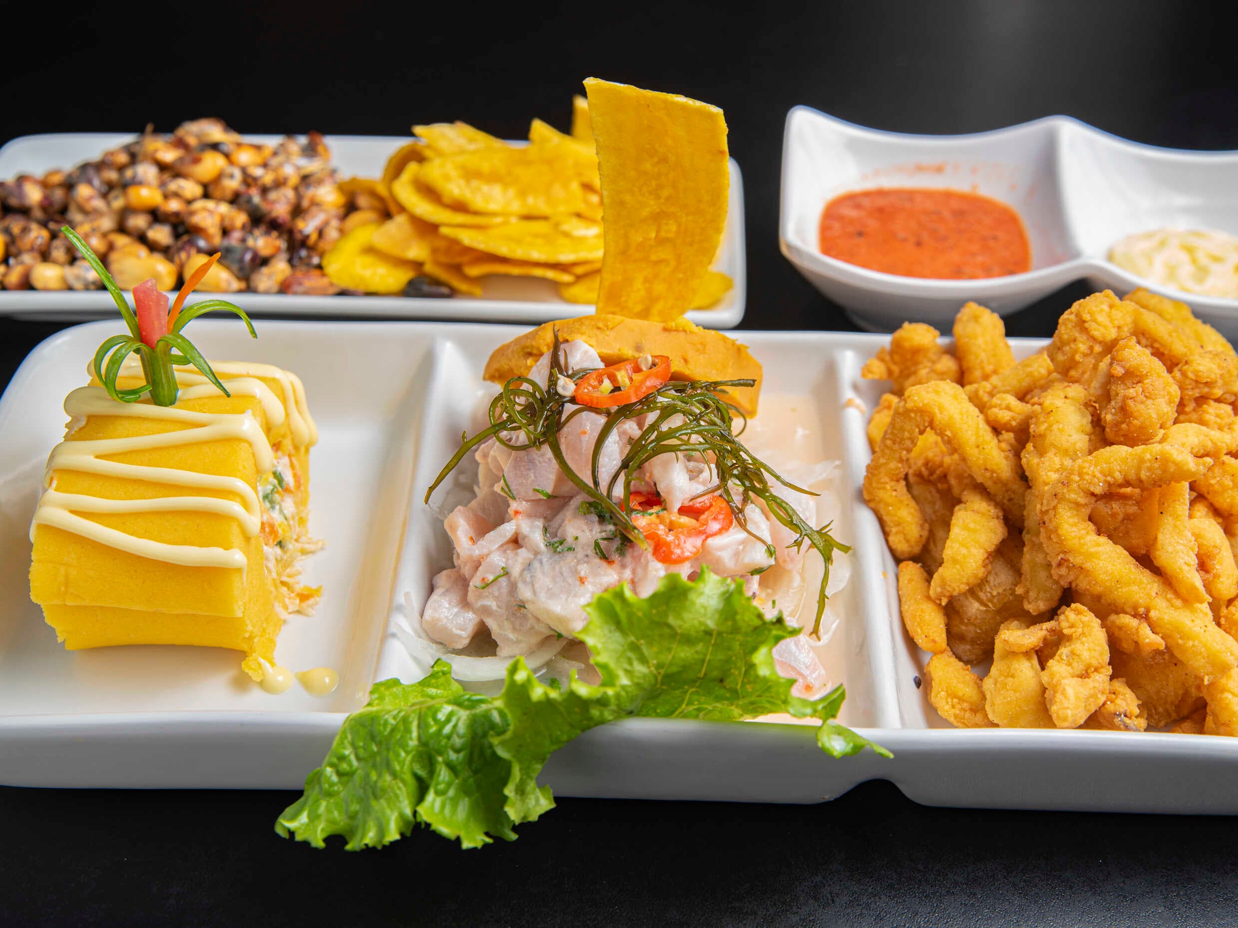 Ceviche, Chicharrón de Pota y Arroz con Mariscos