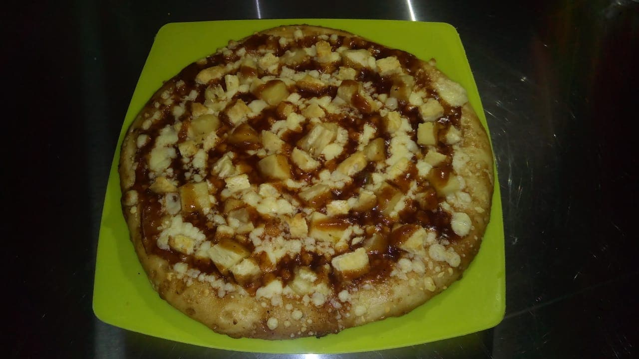 1 Pizza Grande de Especialidad.