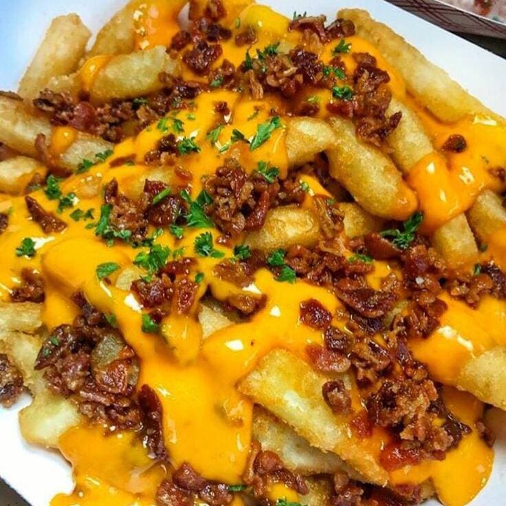 Papas A La Francesa Con Queso Y Tocino
