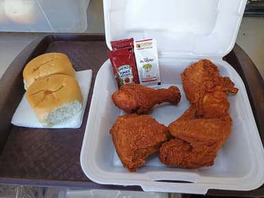 4 pz de Pollo + 2 Panes