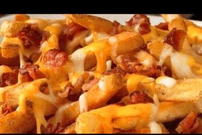 Papas con Tocino.