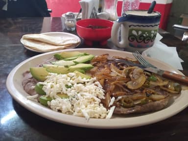 Bistec Encebollado