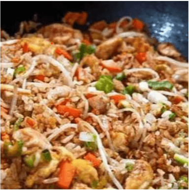 Dos Enteros de Arroz con Cerdo