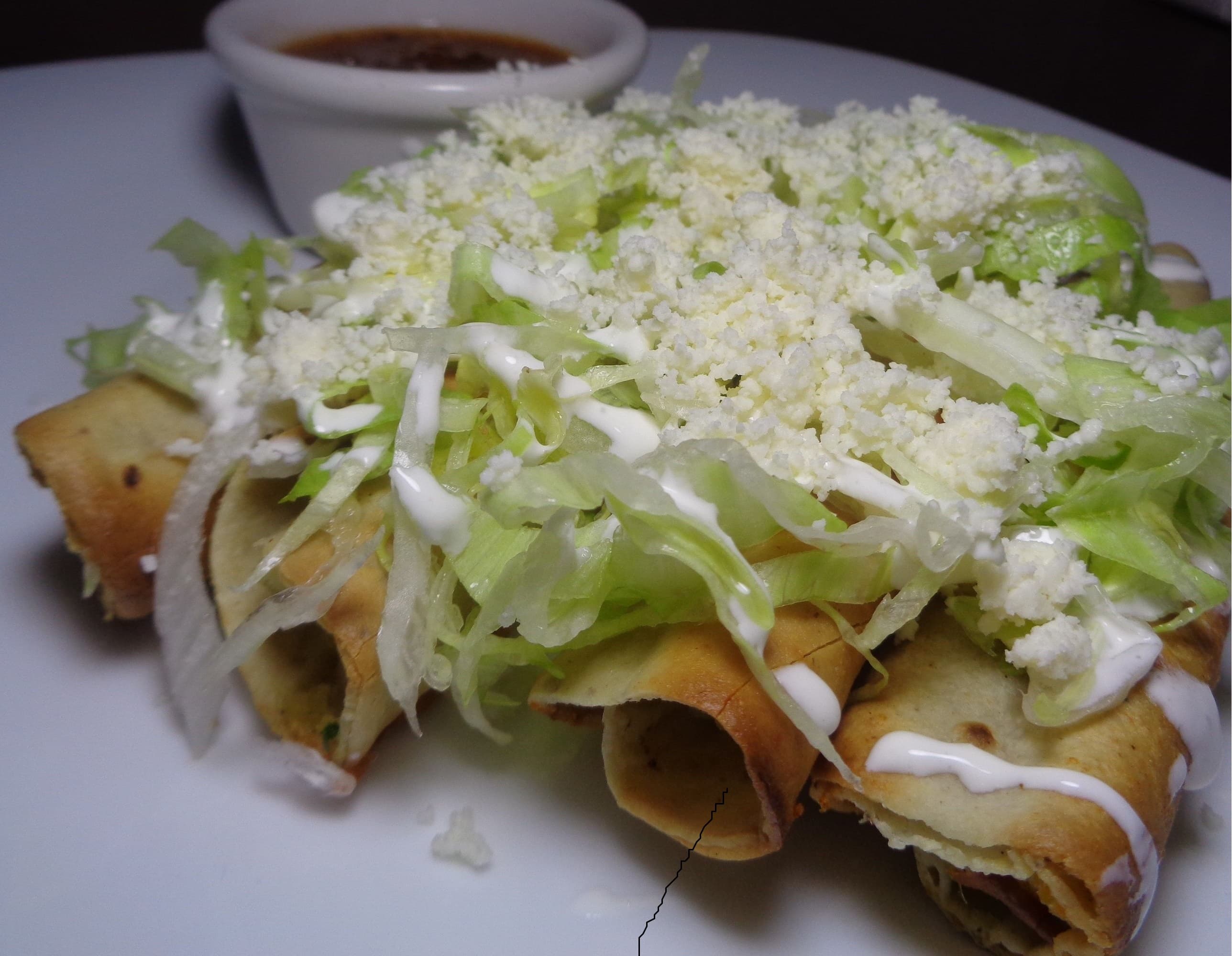 Tacos dorados de pollo
