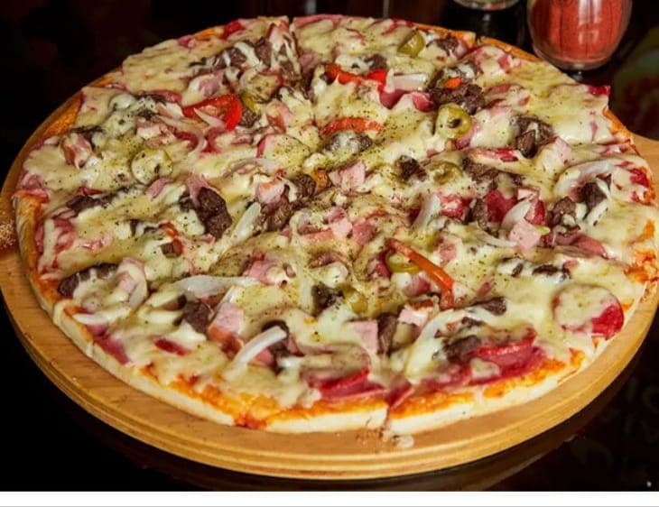 Pizza La Suprema (Mitad de pizza)