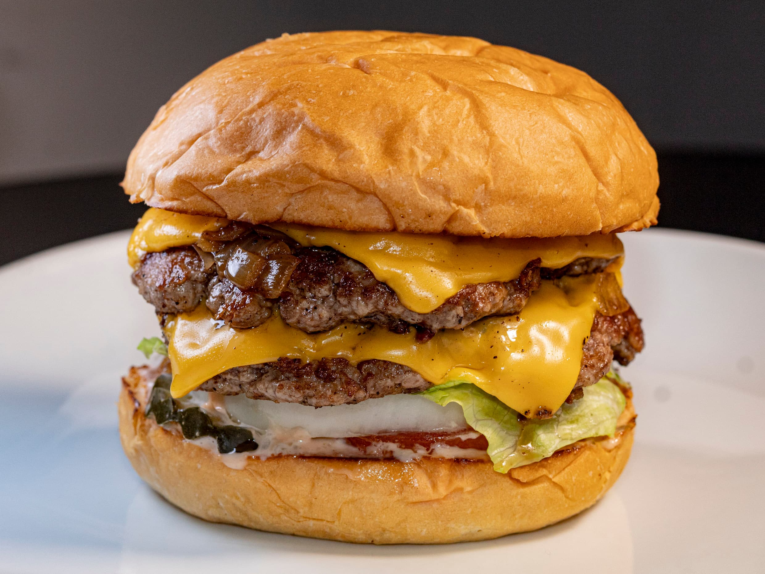 Hamburguesa Clásica Doble + Papas Regulares