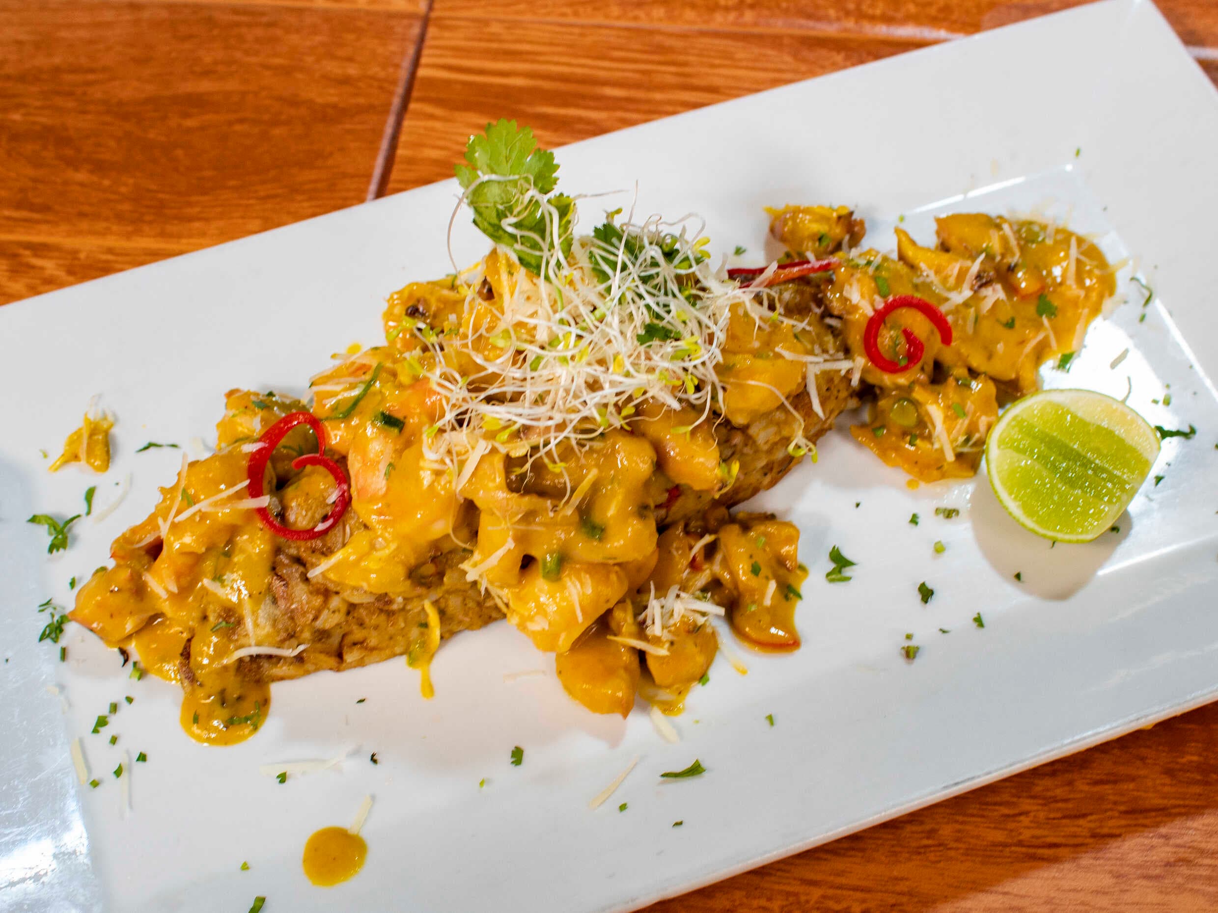 Tacu Tacu en Salsa de Langostinos