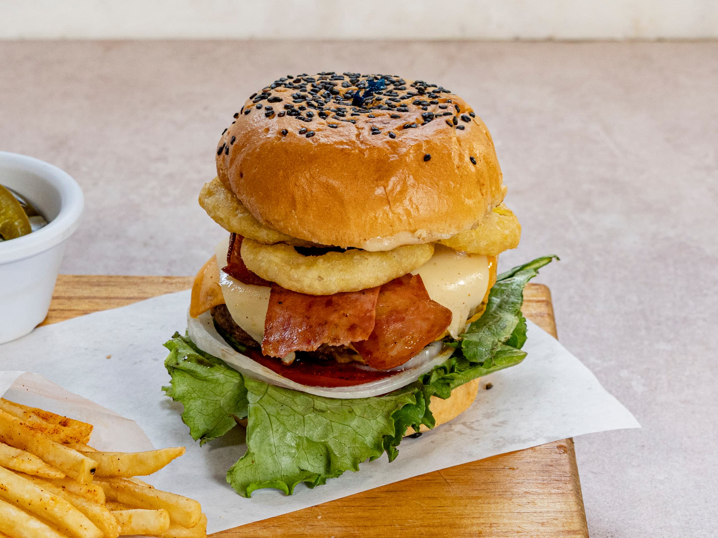 Hamburguesa La Nuestra + Papas.