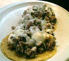 2 Tacos de Bistec con Queso