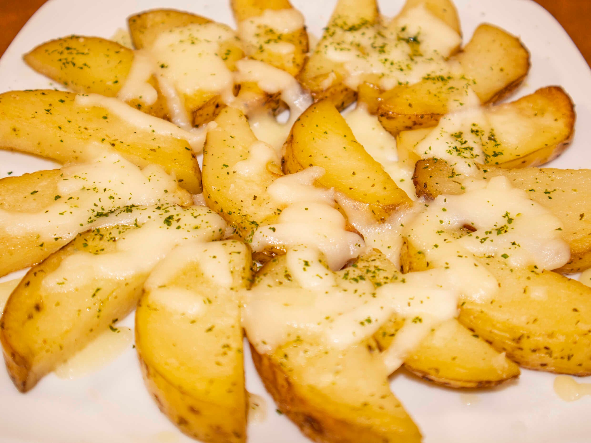 Orden de papas en gajo