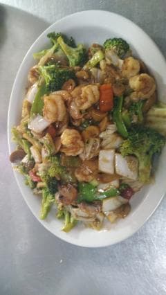 Langostino con champiñones