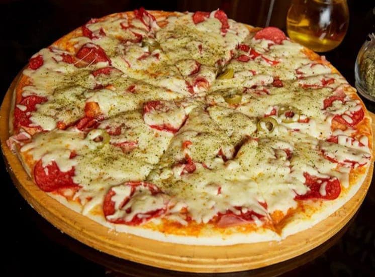 Pizza La Pepperoni Mediana(mitad de pizza)