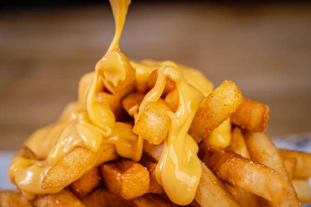 Orden de Papas con Queso y Tocino