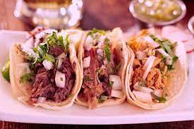 4 Tacos a elección + Refresco