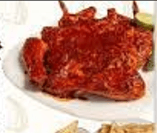 ½ Pollo Enchilado