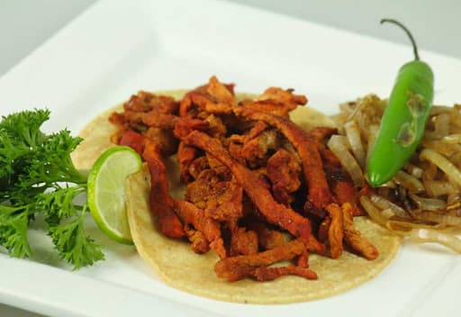 Taco de Enchilada de Puerco