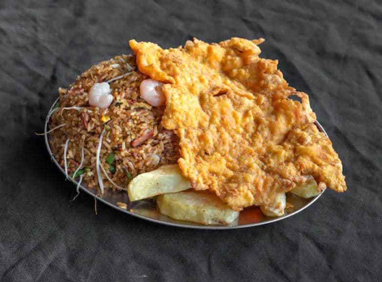 Combo: CHULETA CON ARROZ (6 PER)+ GASEOSA 1.5