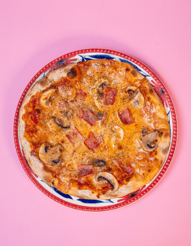 Pizza Jamón y Champiñon.