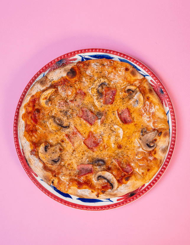Pizza Jamón y Champiñon.