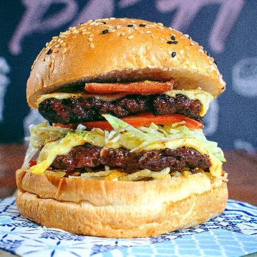 Hamburguesa Doble Carne + Gaseosa Postobon 250ml