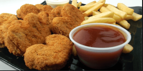 Nuggets de Pollo con Papas 10 Piezas