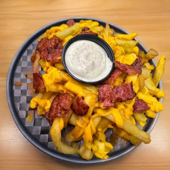 Papas Chedar y Tocineta