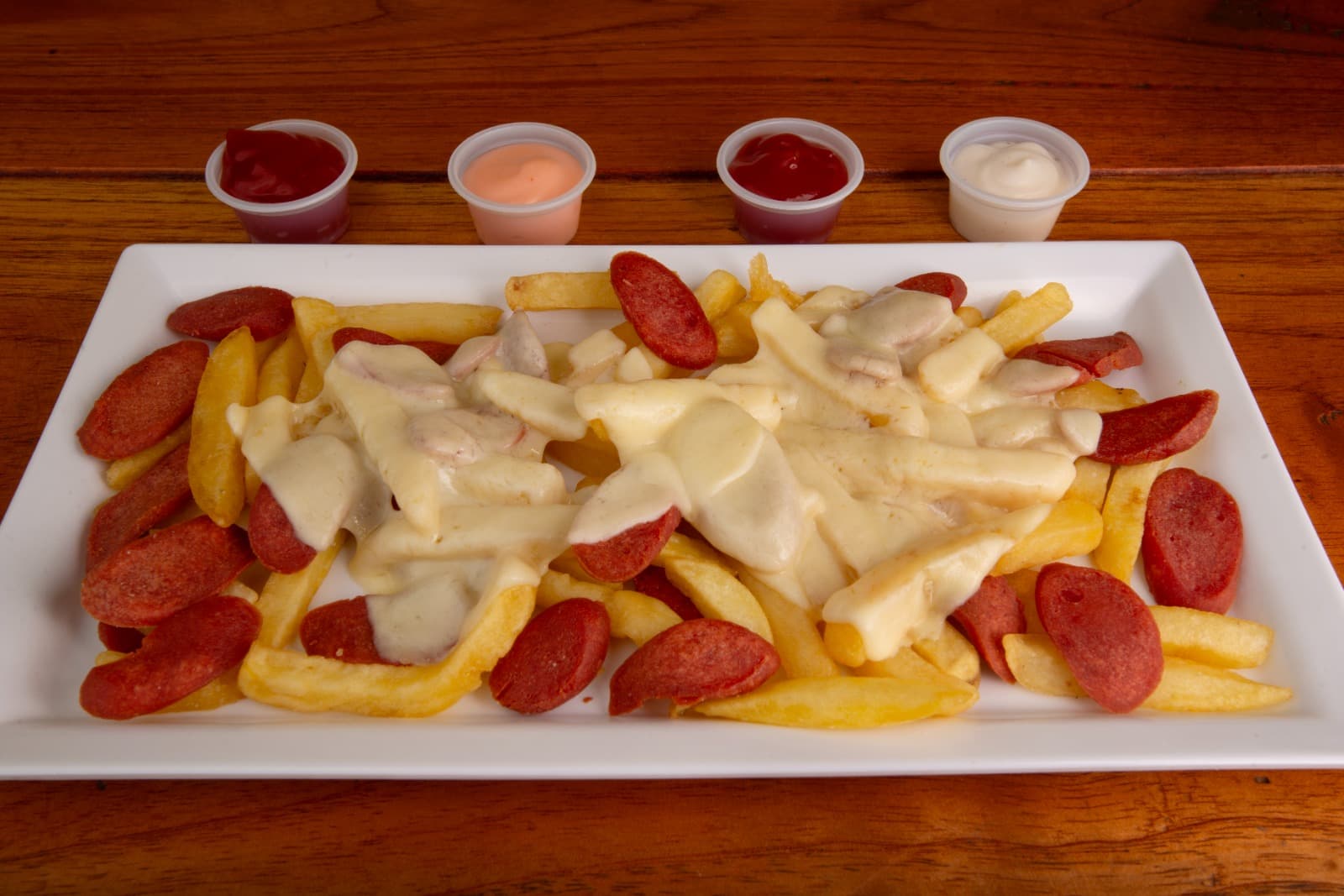 Salchipapa Gratinada