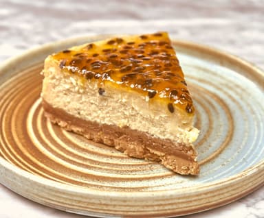 Porción Cheescake Maracuyá
