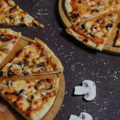 Pizza Grande de Champiñón.