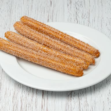Churros con azúcar y canela