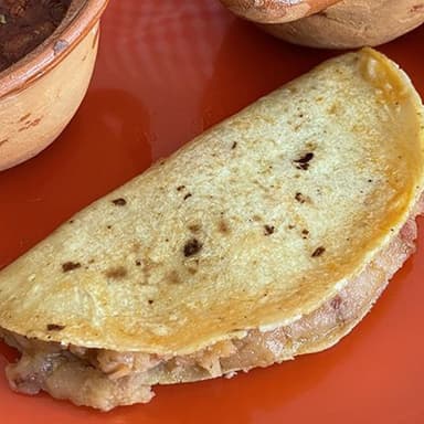 Taco de papa con chorizo