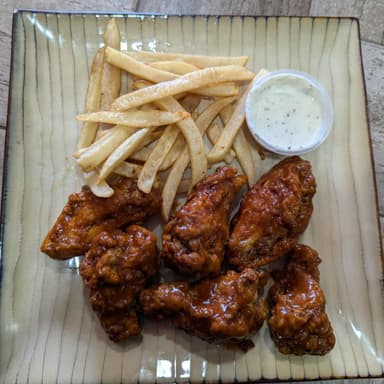orden de alitas con papas