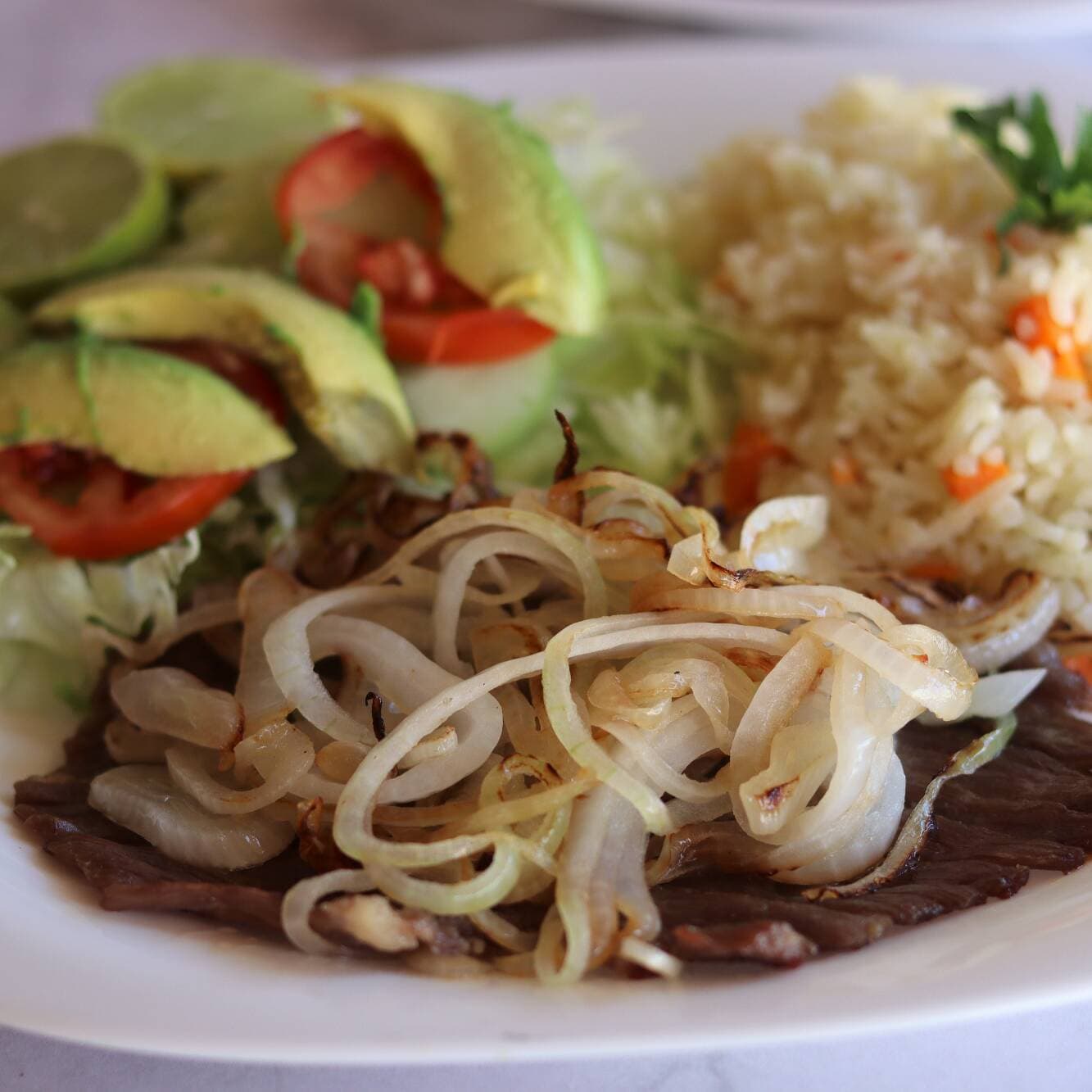 Tasajo Encebollado