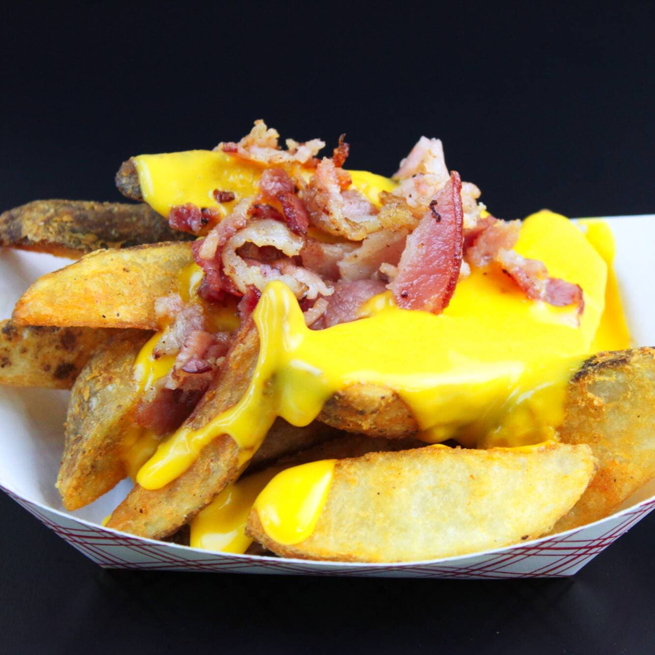 Papas Fritas Gajos con Queso y Tocino