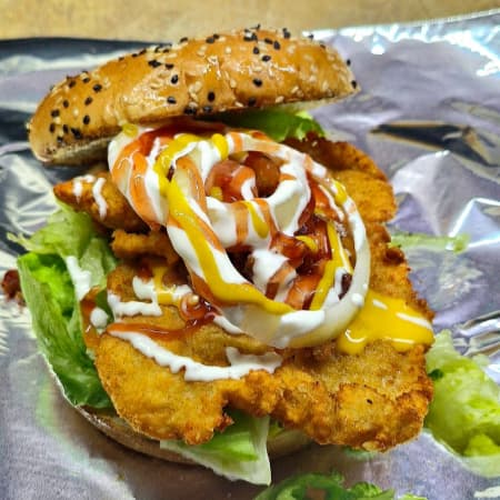 Hamburguesa de Pechuga Empanizada.
