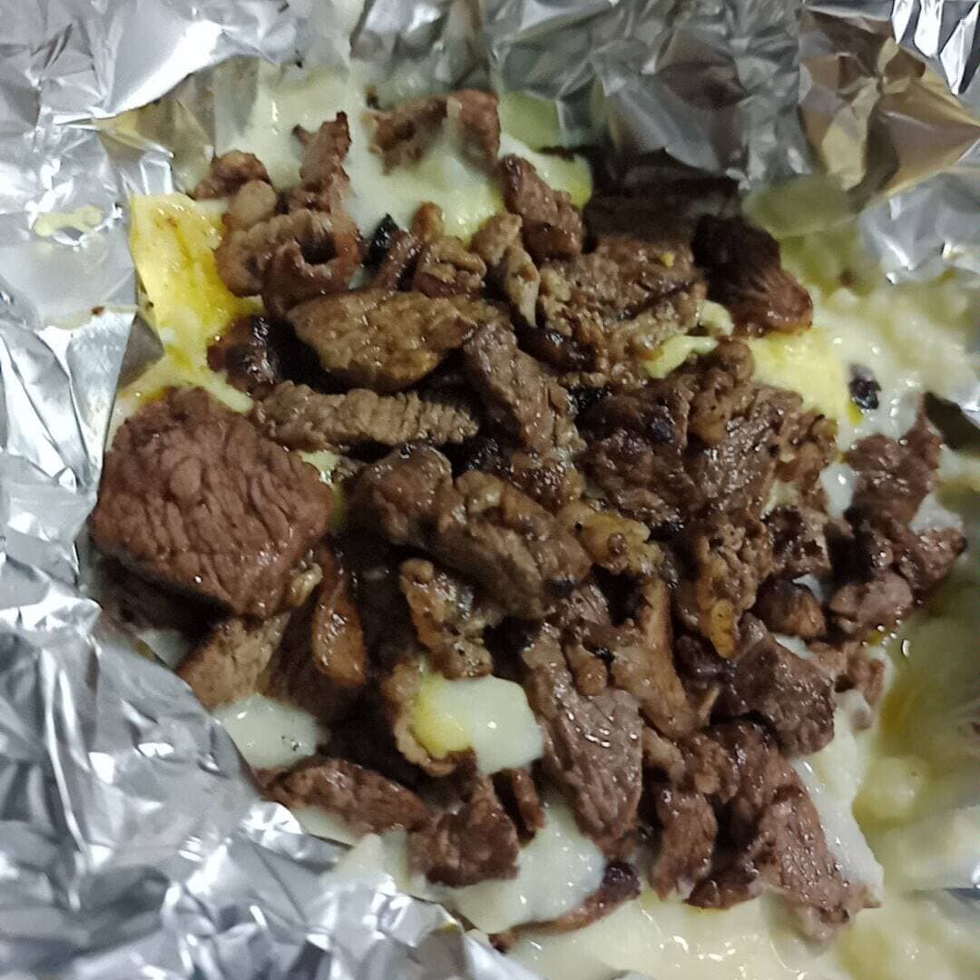 Papa rellena asada