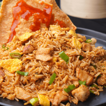 Chaufa de Pollo Broaster en Trozos