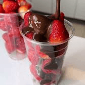Fresas con chocolate derretido