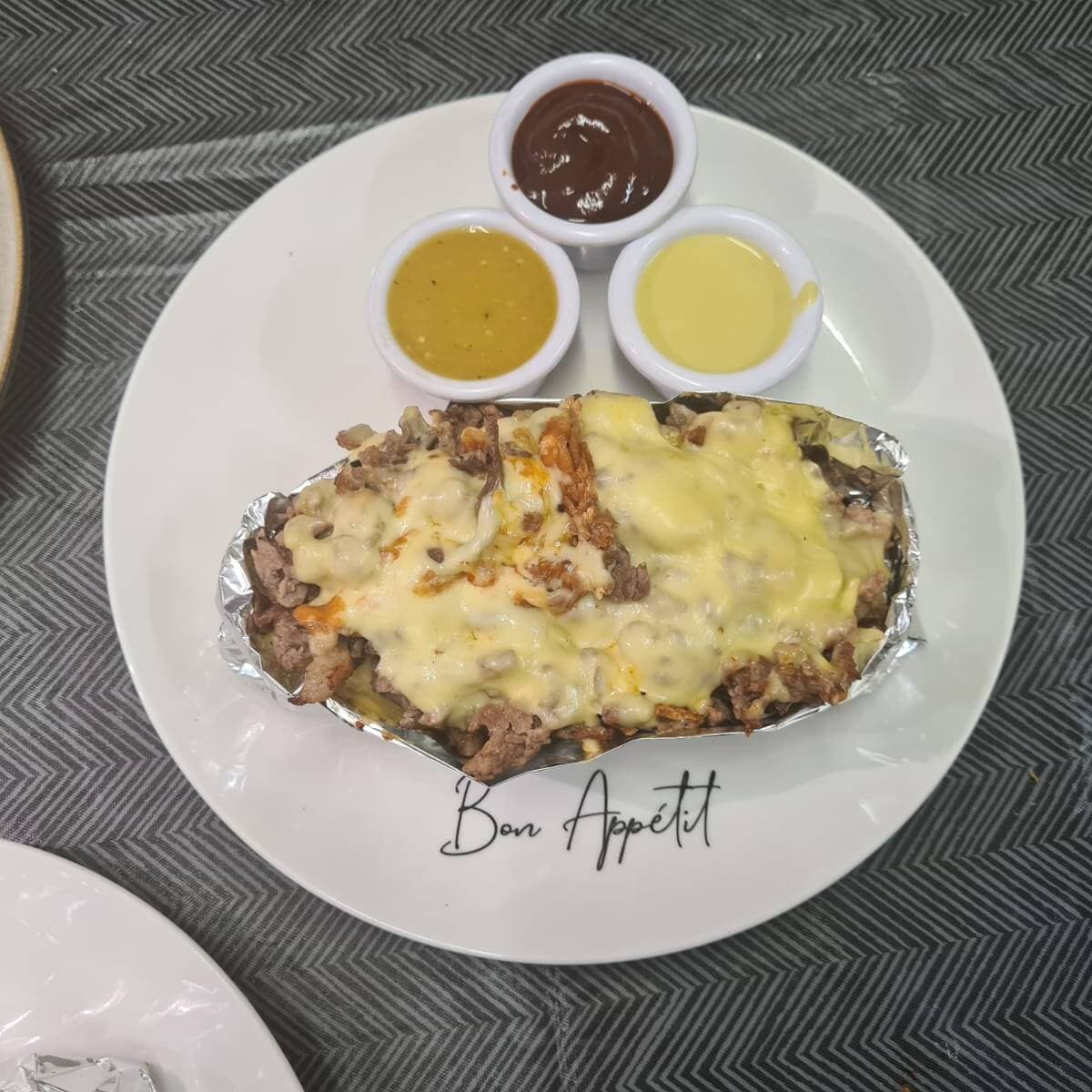 PAPA RELLENA DE CHAMPIÑONES