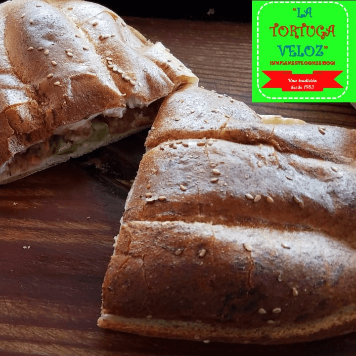 Torta Grande frijolitos refritos con longaniza