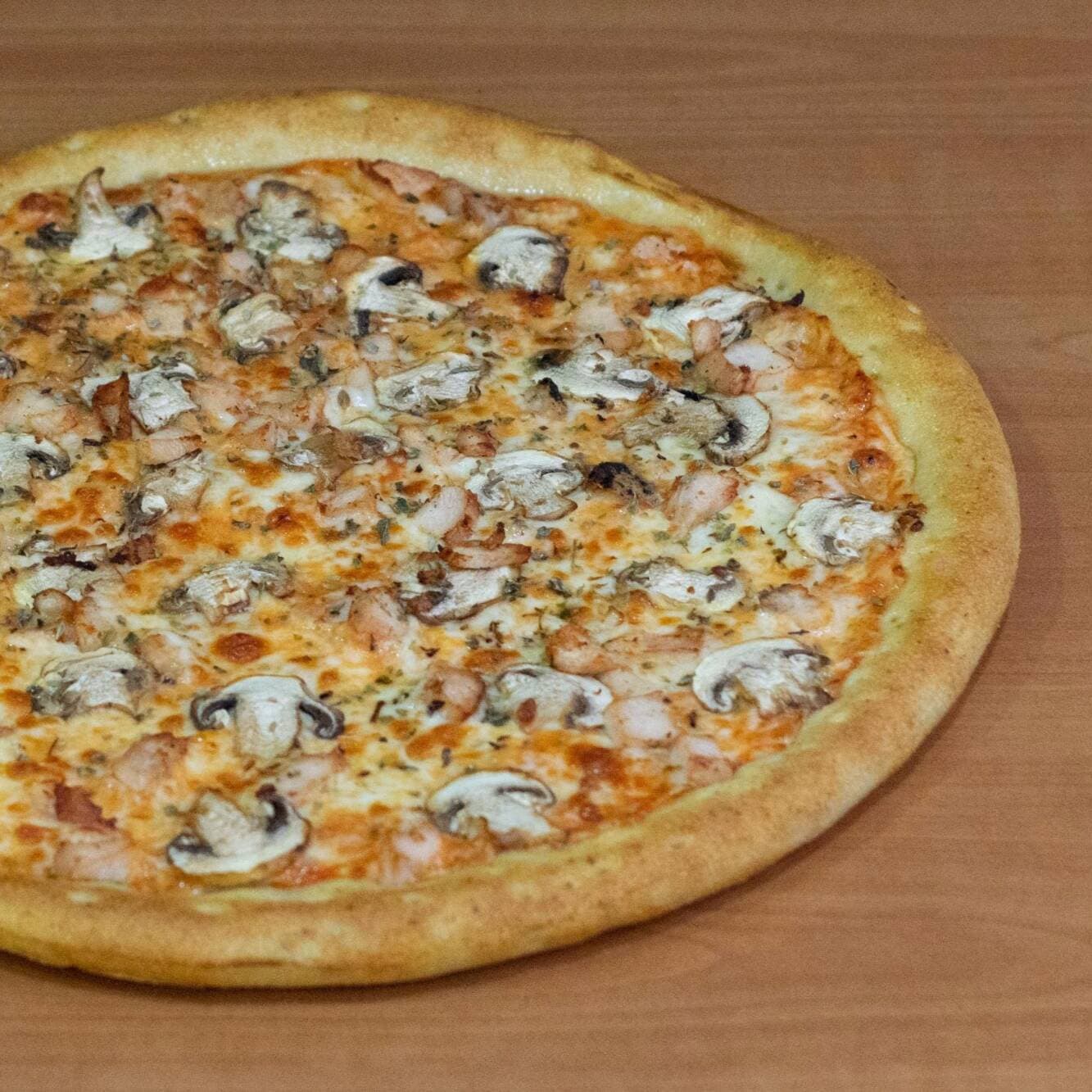 Pizza Champiñón y Pollo Grande